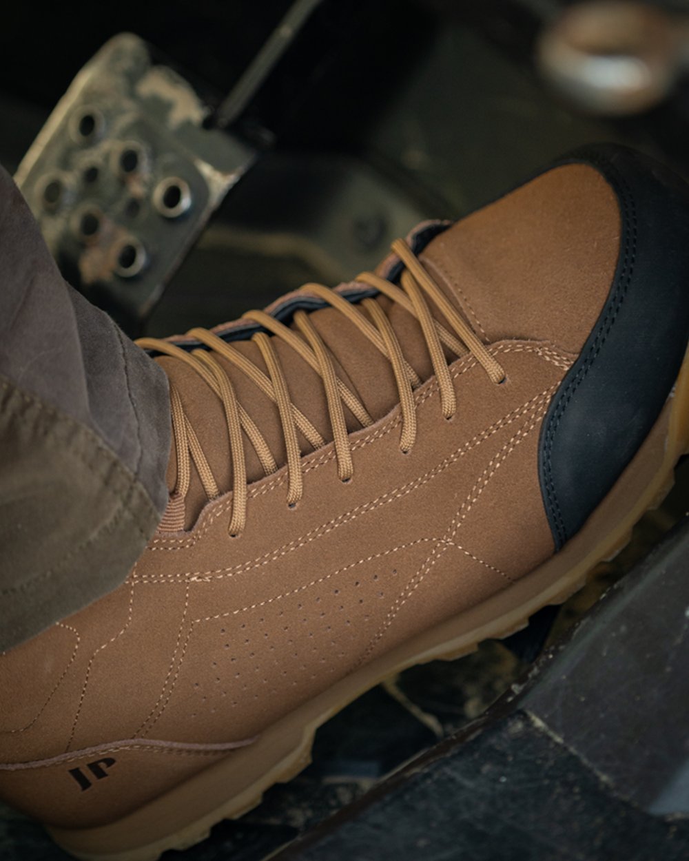Brown coloured Jack Pyke Lowland Boots on car background #colour_brown