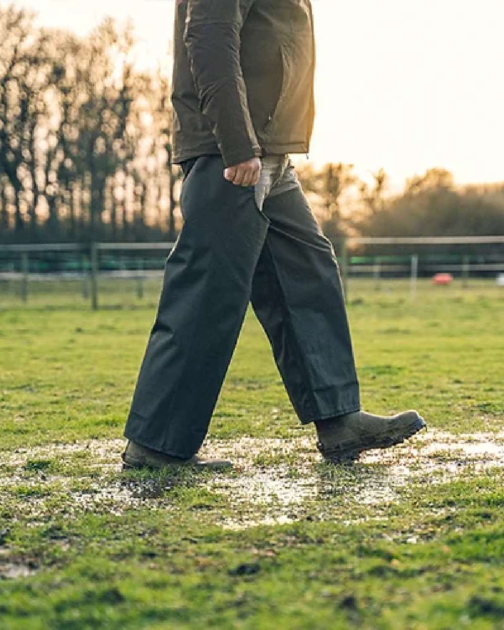Green coloured Jack Pyke Treggings on grass background #colour_green