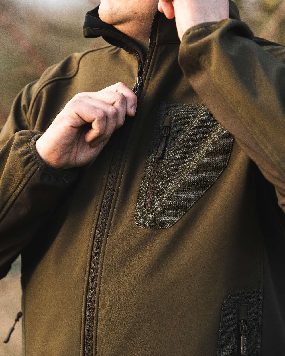 Green Coloured Jack Pyke Weardale Softshell Jacket on outdoor background #colour_green