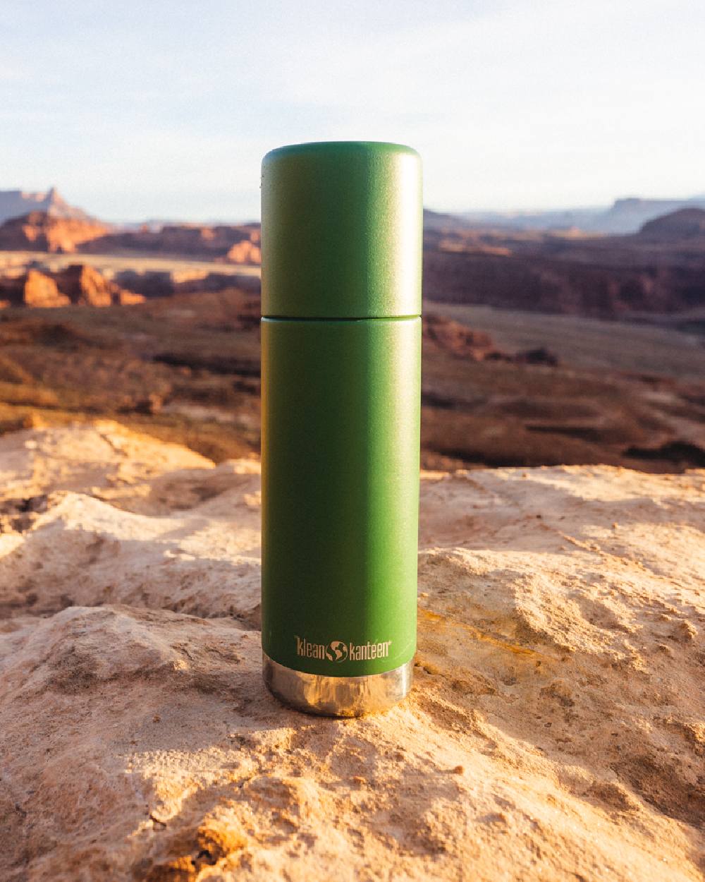 Fairway coloured Klean Kanteen Insulated TKPro Flask on mountain background #colour_fairway