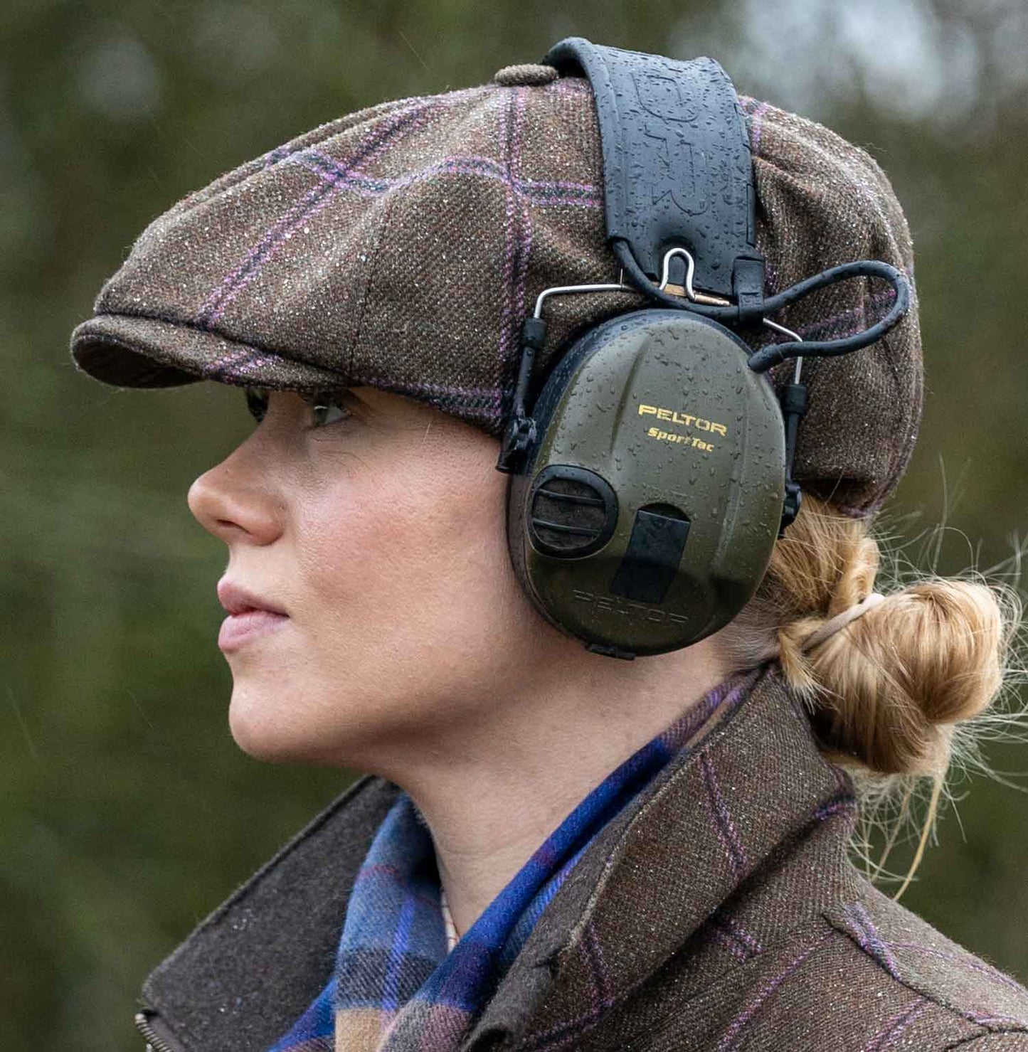 Woman wears Laksen Pippa Bakerboy Cap.