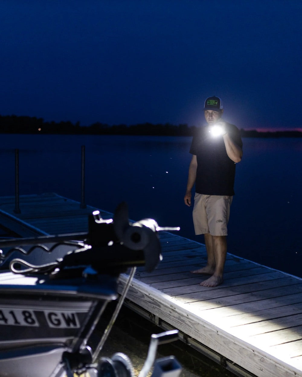 Espresso Brown Coloured Led Lenser P18R Signature Rechargeable Torch on lake background #colour_espresso-brown