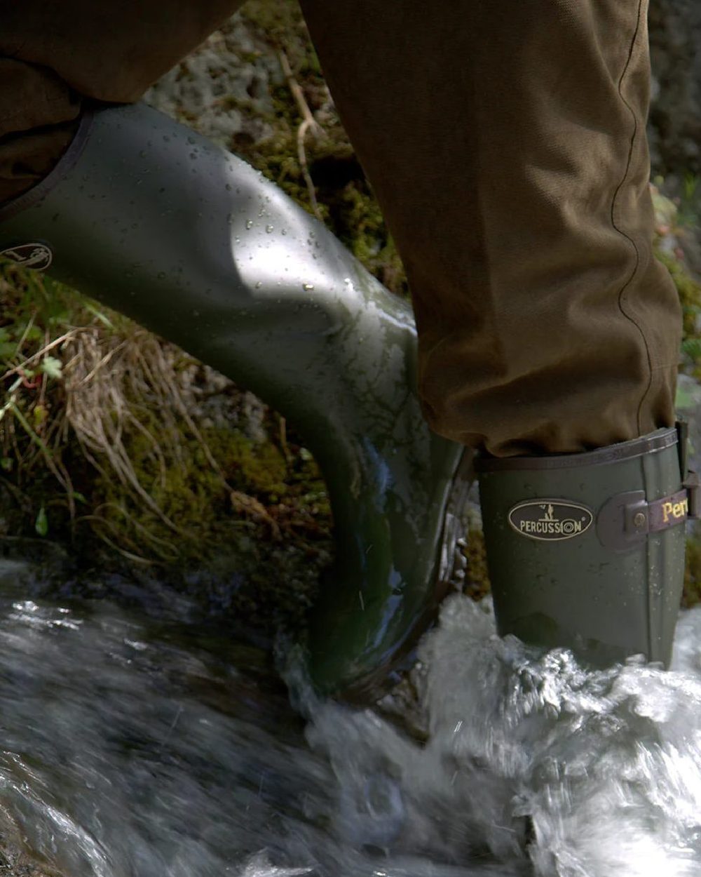 Khaki coloured Percussion Sologne Neoprene Wellington Boots on marshland background #colour_khaki