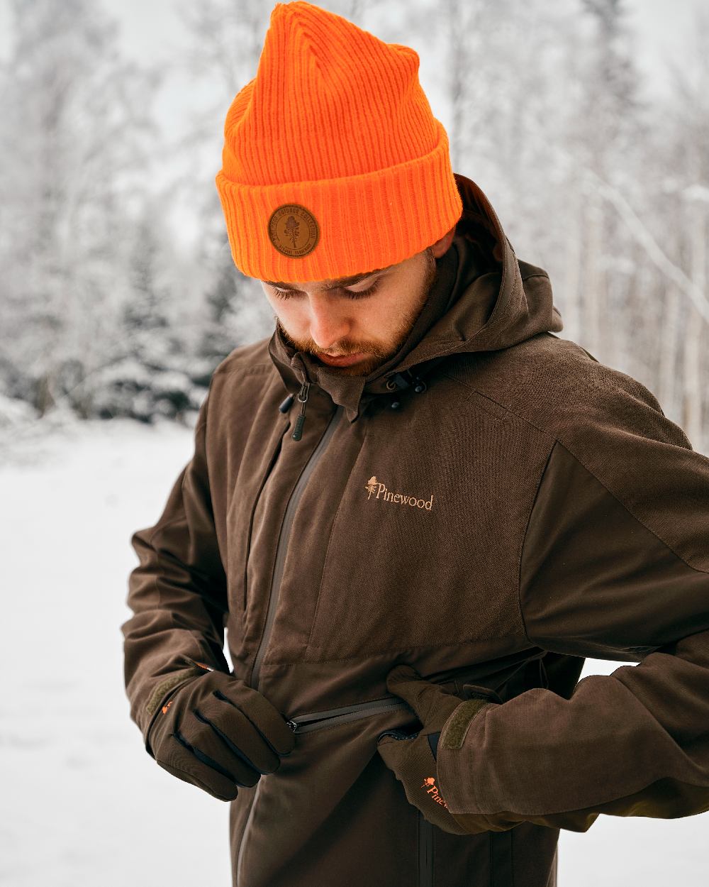 Moss Green Black Coloured Pinewood Hunters Neoprene Gloves on snow background #colour_moss-green-black