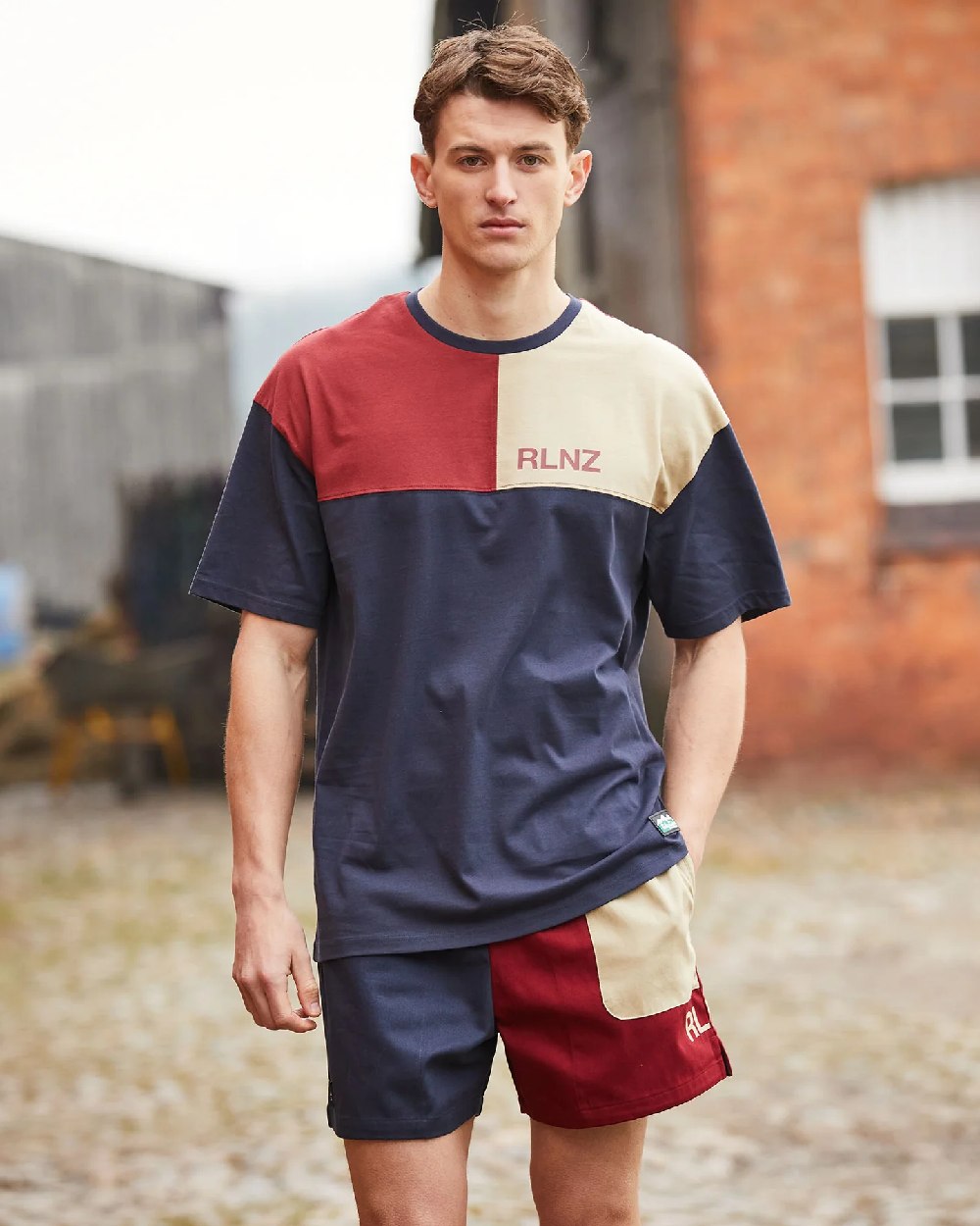 Navy Multi coloured Ridgeline Backslider Shorts on blurry background #colour_navy-multi