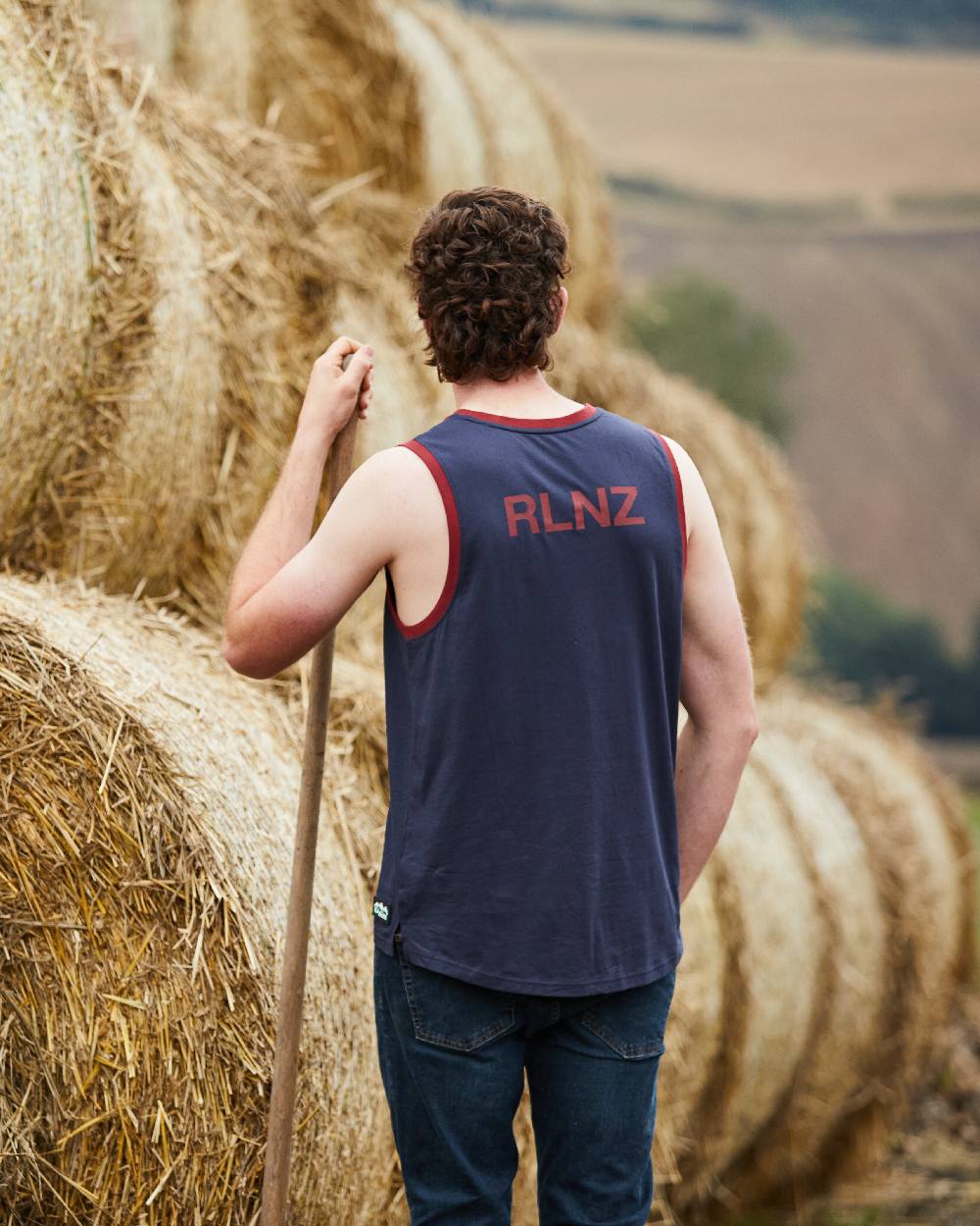 Navy Multi coloured Ridgeline Backslider Singlet Top on haystack background #colour_navy-multi