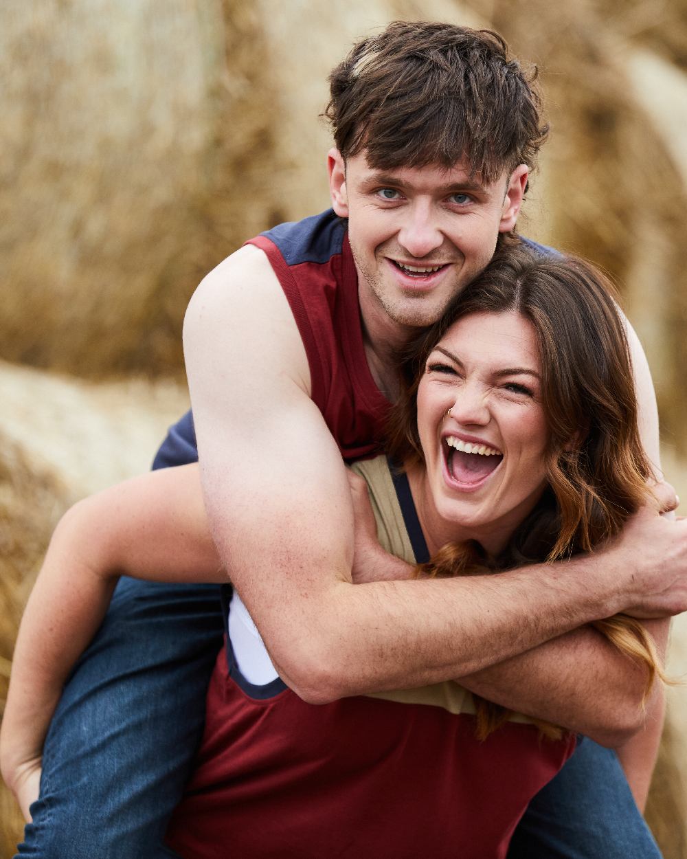 Rhubarb Multi coloured Ridgeline Backslider Singlet Top on haystack background #colour_rhubarb-multi