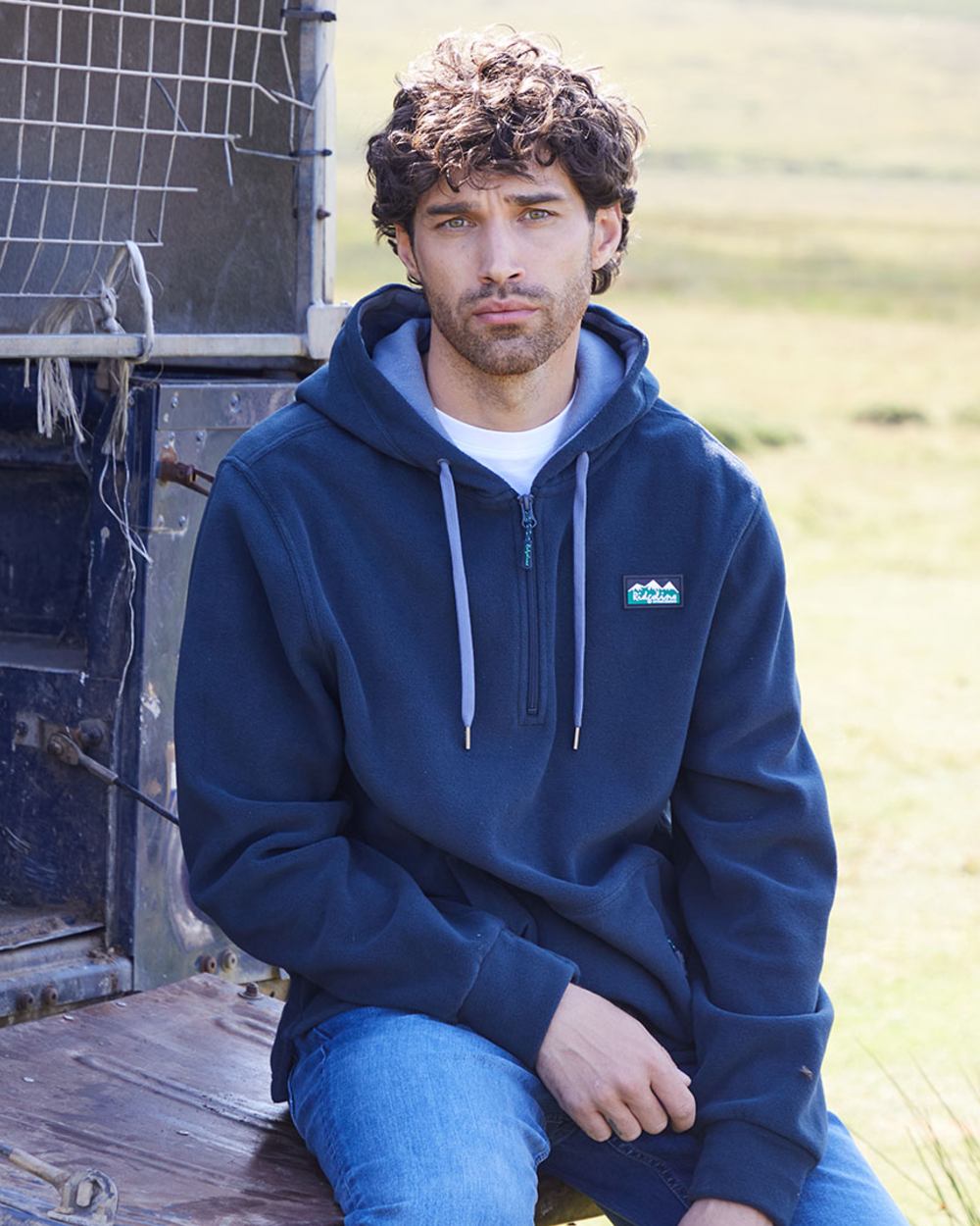 Navy coloured Ridgeline Ballistic Hooded Fleece on outdoor background #colour_navy