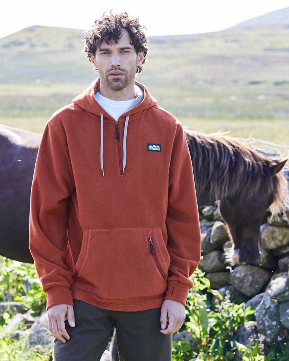 Russet coloured Ridgeline Ballistic Hooded Fleece on outdoor background #colour_russet