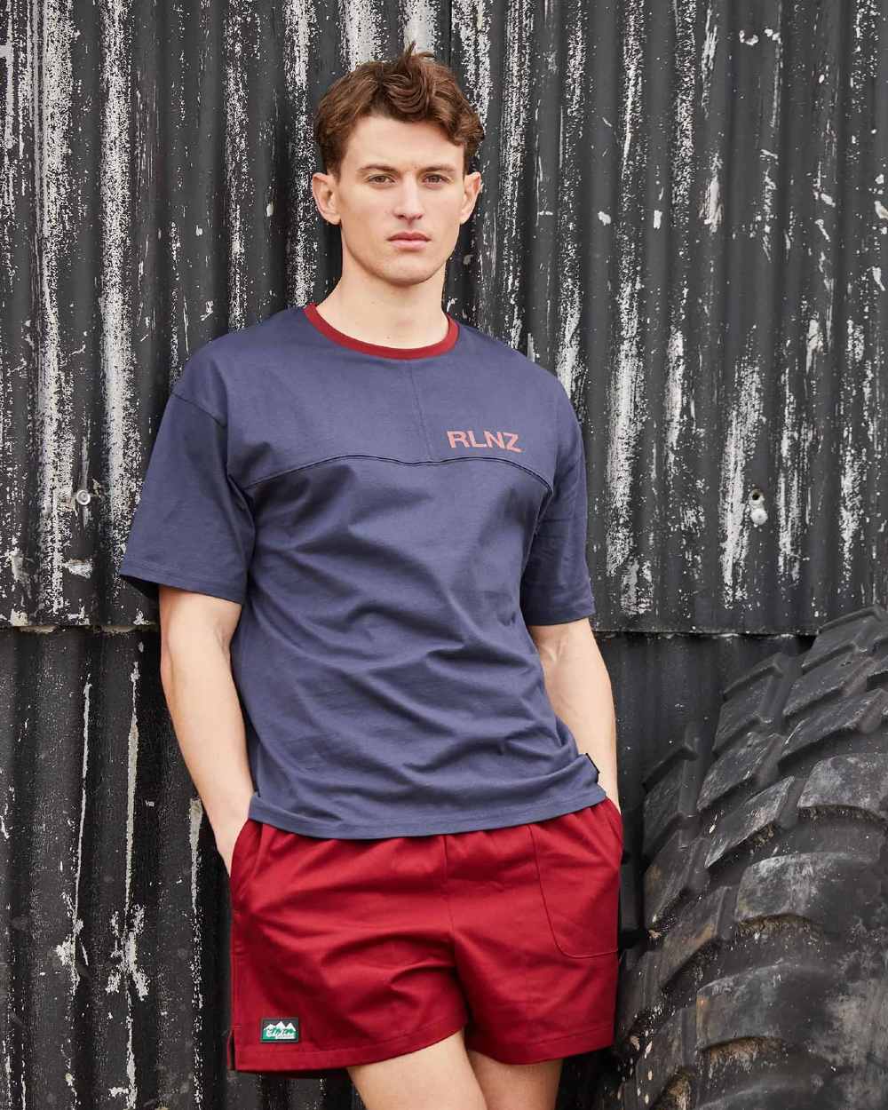 Navy coloured Ridgeline Hose Down T-Shirt on black wall background #colour_navy