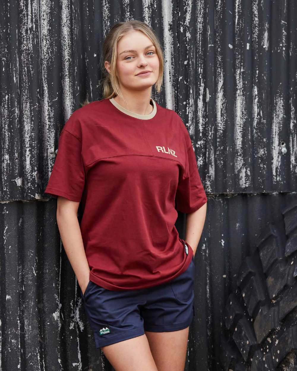 Rhubarb coloured Ridgeline Hose Down T-Shirt on black wall background #colour_rhubarb
