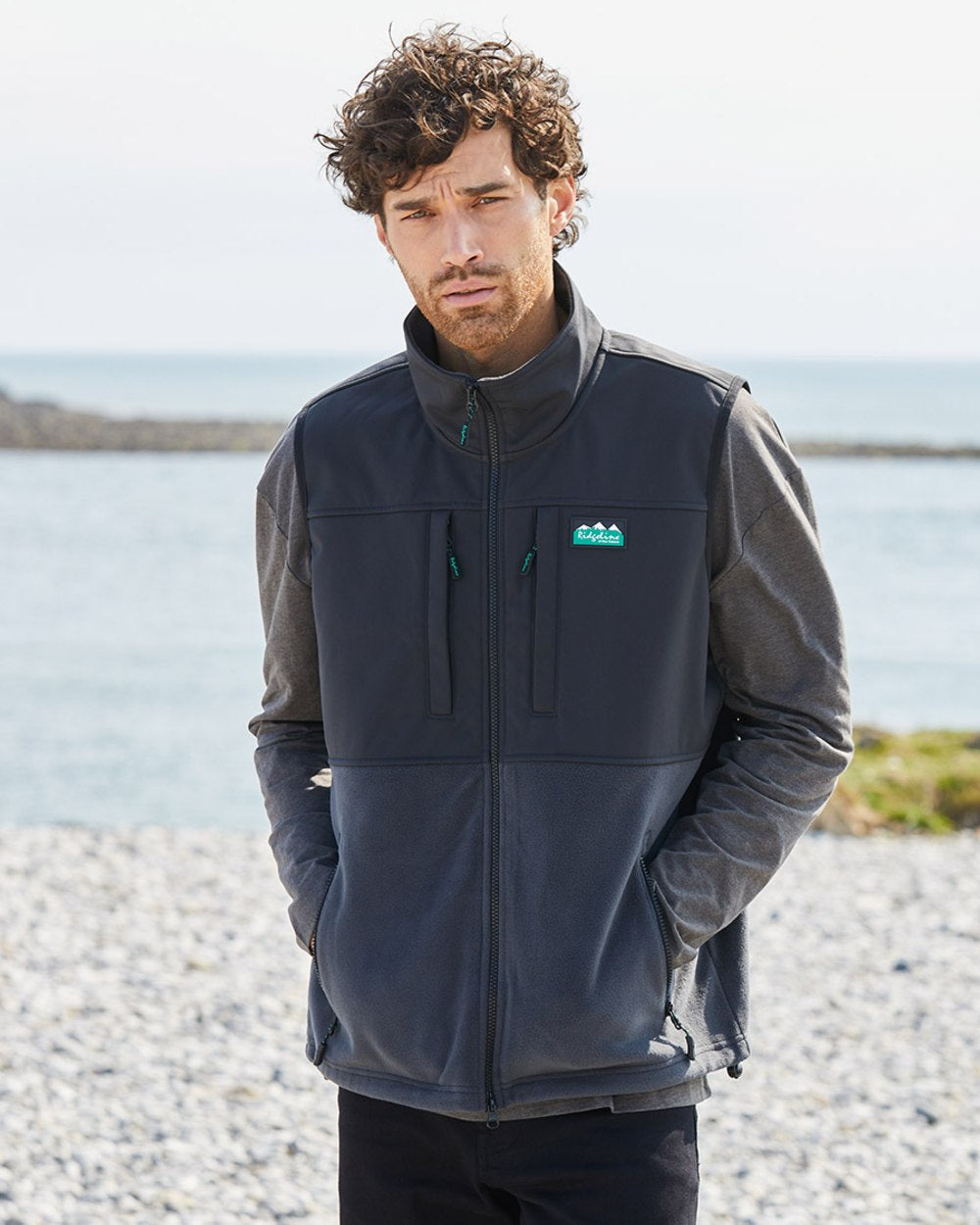 Shale coloured Ridgeline Hybrid Fleece Gilet on sea background #colour_shale