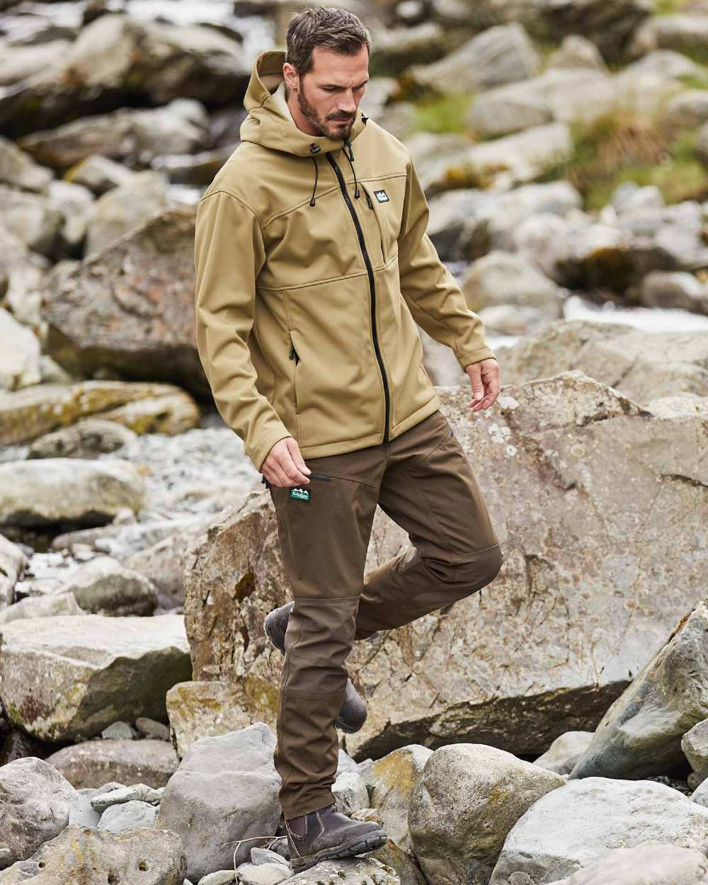 Faded Teak coloured Ridgeline Mens Gradient Jacket on rock background #colour_faded-teak