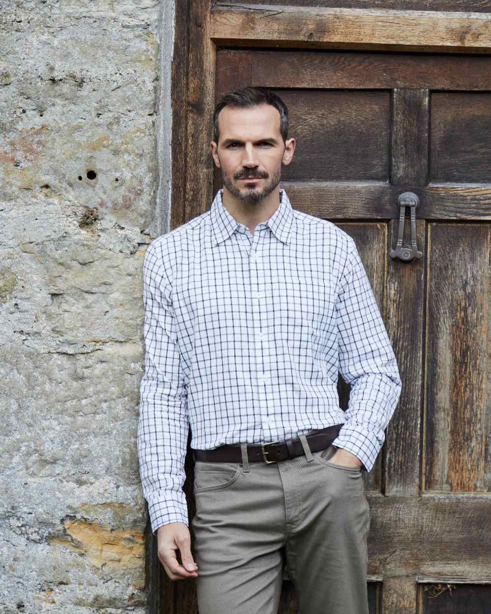 Navy Storm coloured Ridgeline Mens Sedgebrook Shirt on door background #colour_navy-storm