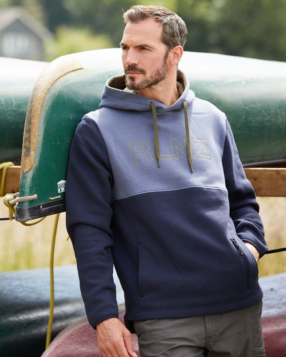 Navy coloured Ridgeline Mens South Island Hoodie on blur background #colour_navy