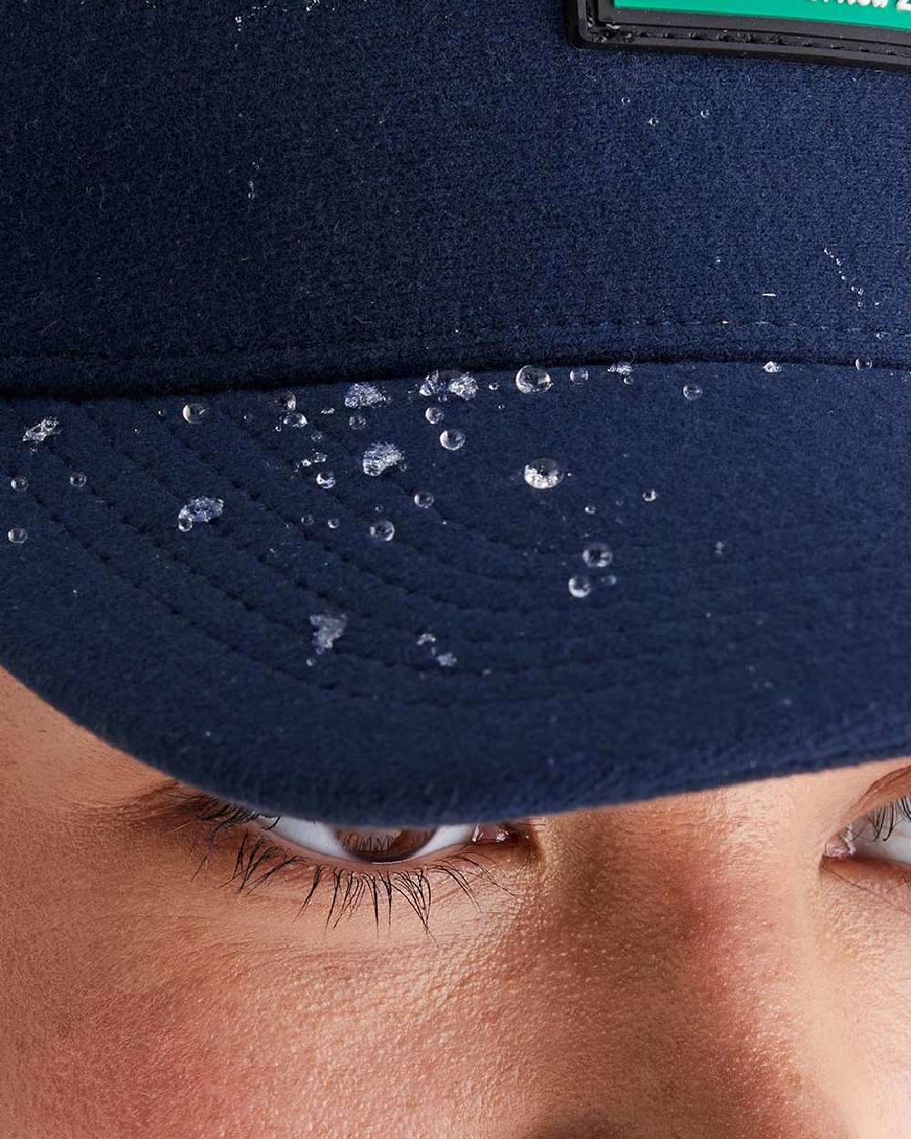 Navy Coloured Ridgeline Monsoon Trucker Cap on white background #colour_navy