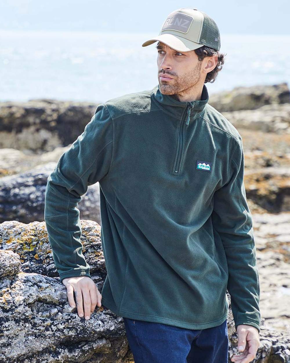 Deep Forest coloured Ridgeline Narvik Fleece on sea background #colour_deep-forest