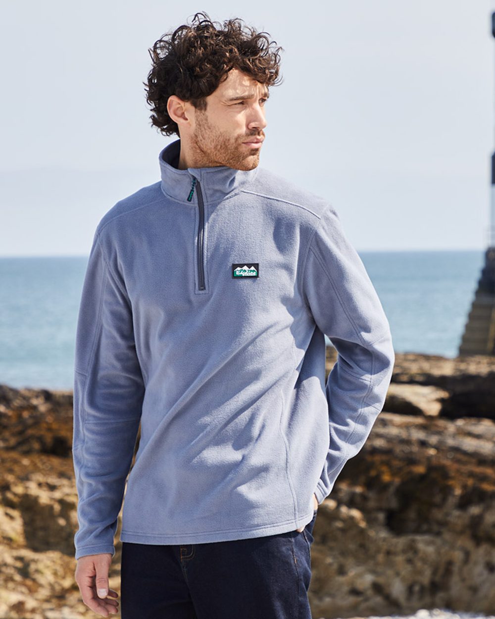 Storm coloured Ridgeline Narvik Fleece on sea background #colour_storm