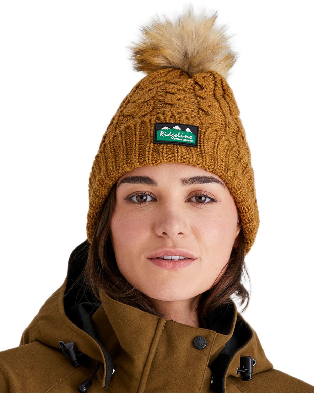 Ochre Coloured Ridgeline Nordic Fleck Bobble Hat on white background #colour_ochre