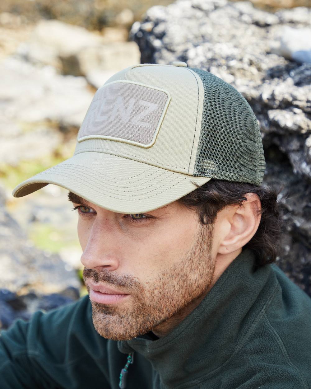 Eucalyptus Coloured Ridgeline RLNZ Trucker Cap on outdoor background #colour_eucalyptus