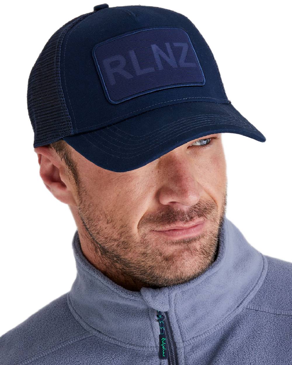 Navy Coloured Ridgeline RLNZ Trucker Cap on white background #colour_navy