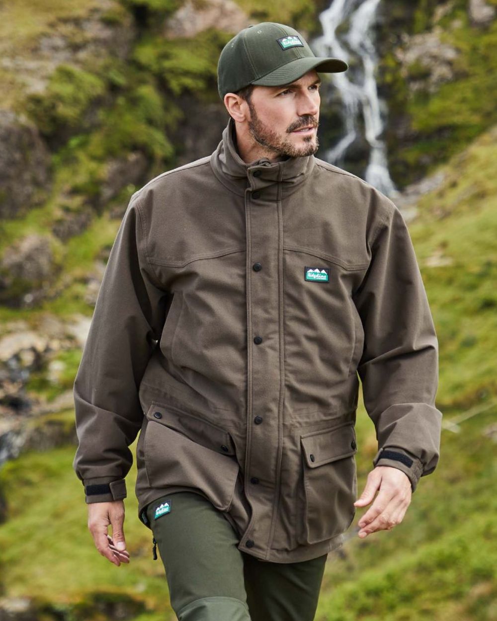 Bark coloured Ridgeline Torrent III Waterproof Jacket on mountain background #colour_bark