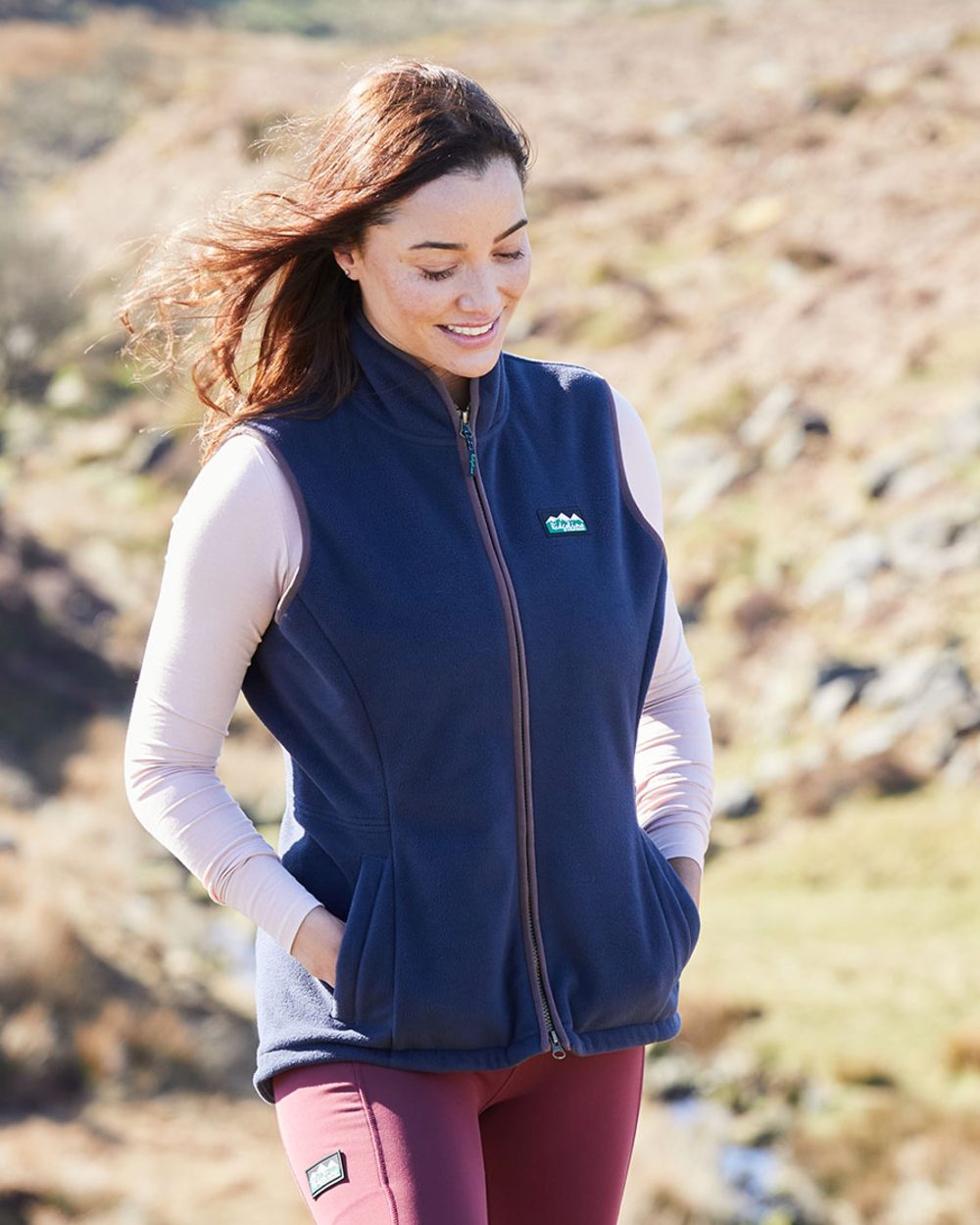 Navy coloured Ridgeline Womens Kodiak Gilet on mountain background #colour_navy