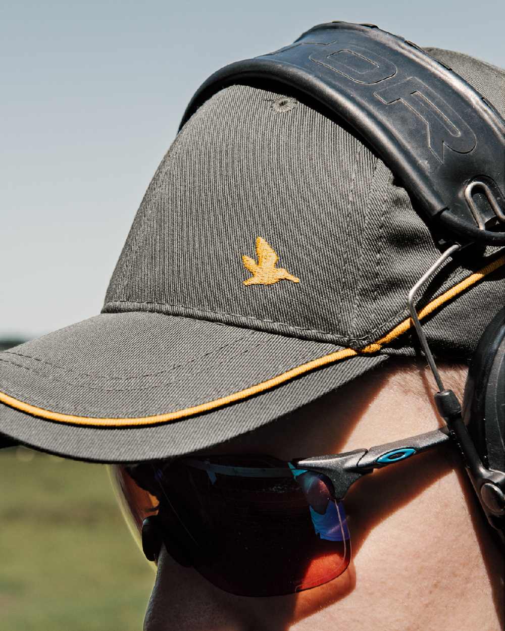 Gunmeta Coloured Seeland Mens Skeet Cap on outdoor background #colour_gunmeta