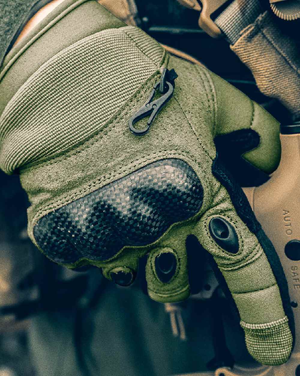 Green Coloured Viper Elite Gloves on blurry background #colour_green