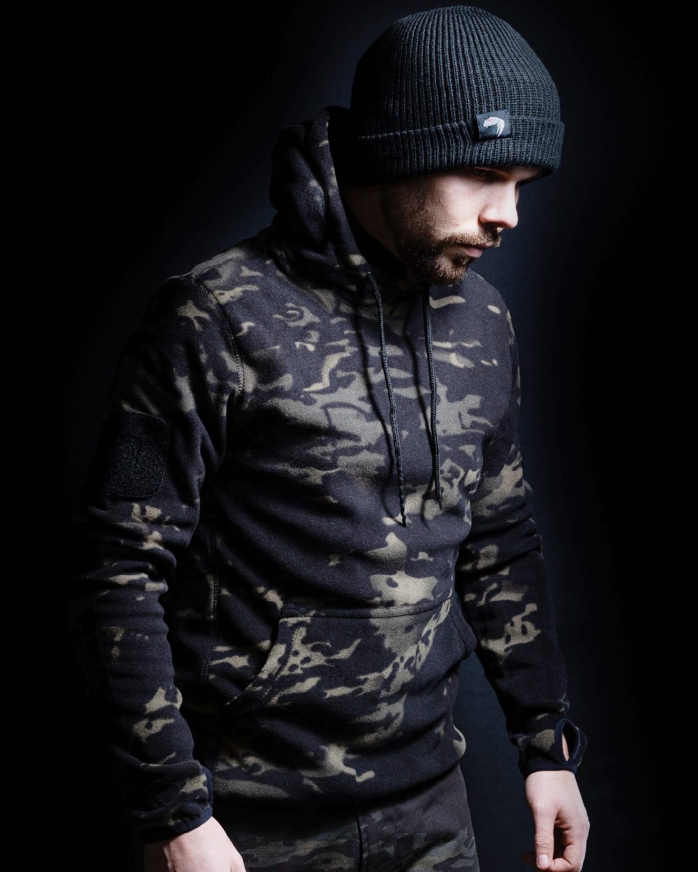VCAM Black Coloured Viper Fleece Hoodie on blurry background #colour_vcam-black