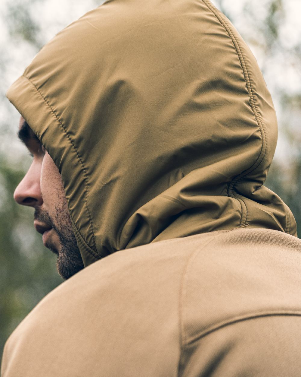 Coyote coloured Viper Storm Hoodie on blurry background #colour_coyote