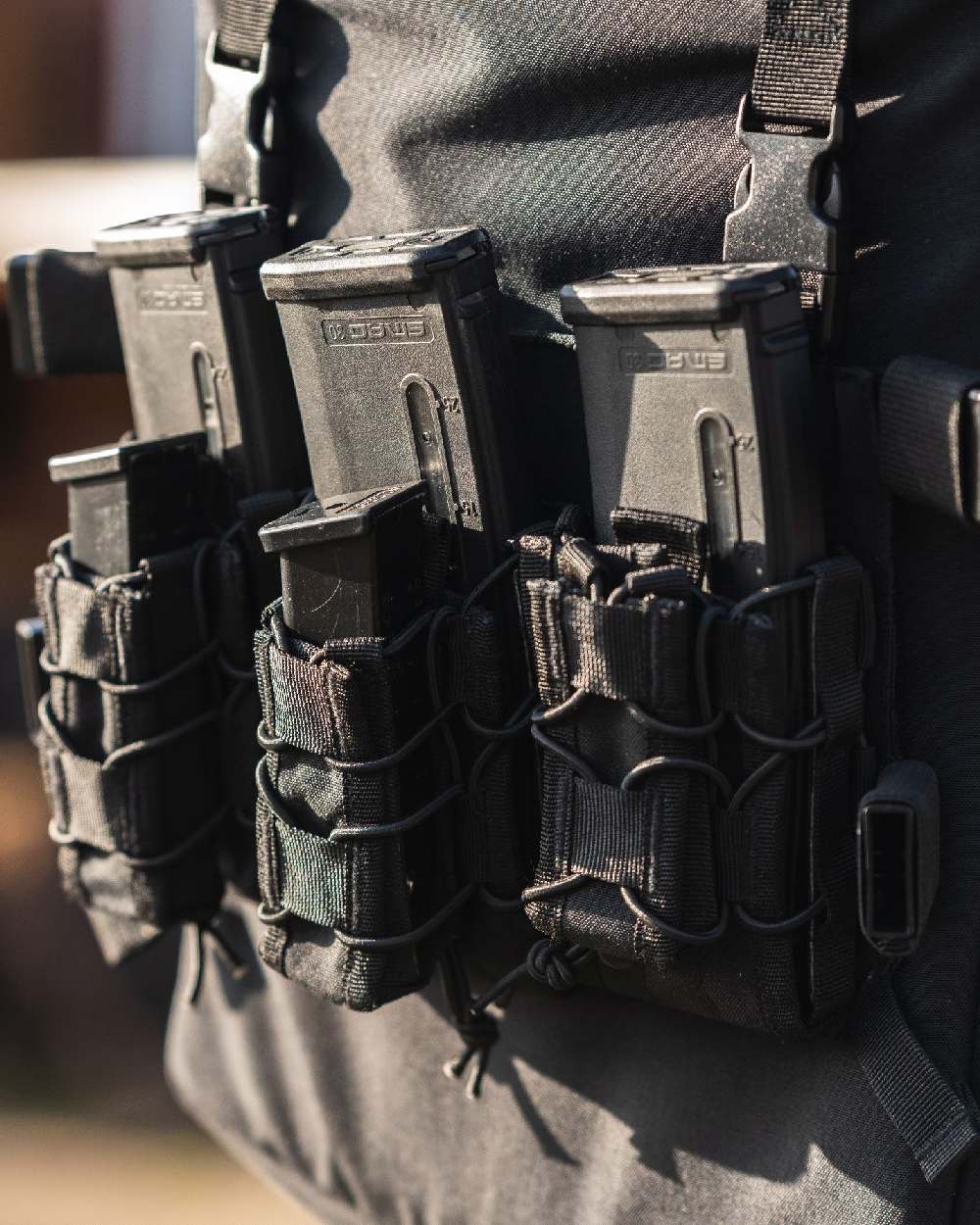 Black Coloured Viper VX Buckle Up Mag Rig on blurry background #colour_black