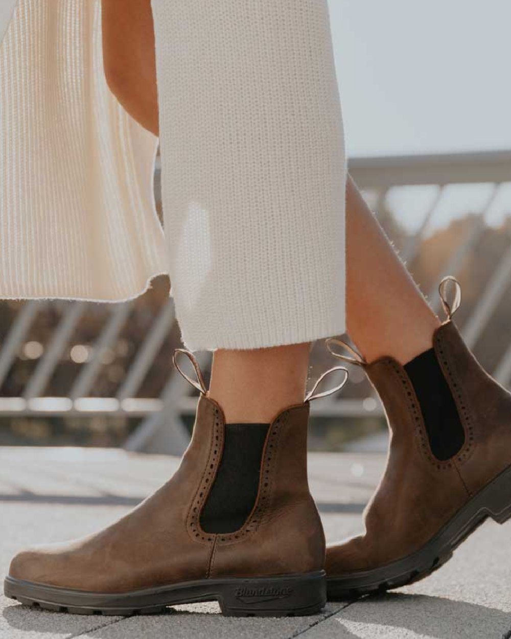 Antique Brown Coloured Blundstone Womens 2151 Antique Brown Leather Chelsea Boots On A Over Bridge Background #colour_antique-brown
