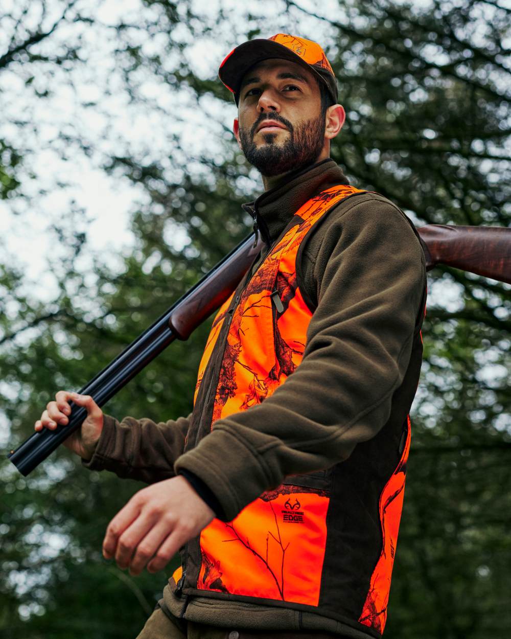 Tarmac Green Coloured Deerhunter Eagle Fleece Jacket On A Forest Background #colour_tarmac-green