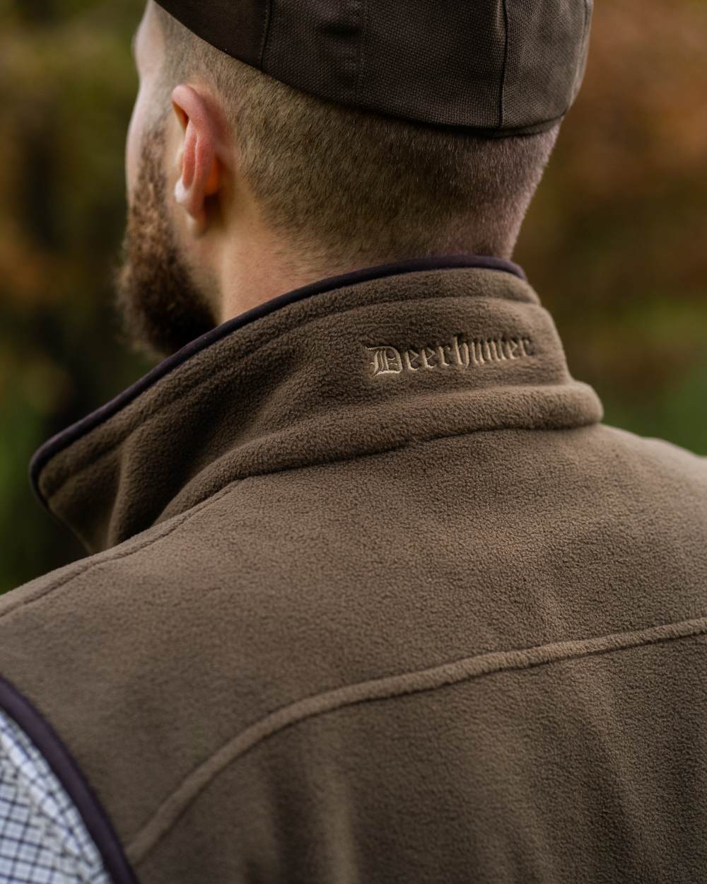 Tarmac Green Coloured Deerhunter Eagle Fleece Waistcoat On A Forest Background #colour_tarmac-green