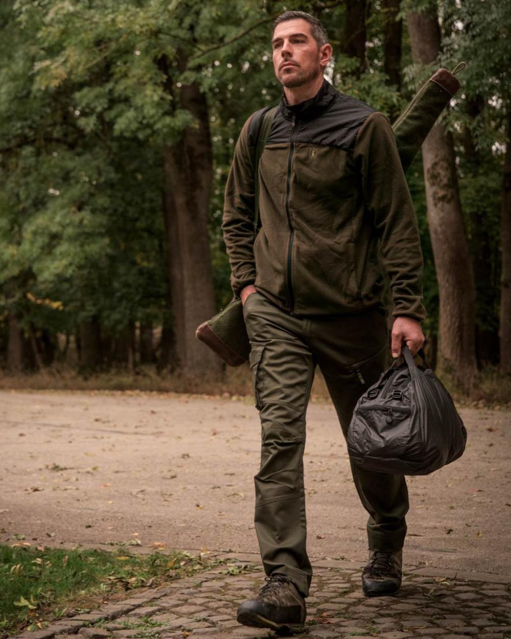 Chestnut Brown coloured Deerhunter Northward Fleece Jacket on Forest background #colour_chestnut-brown