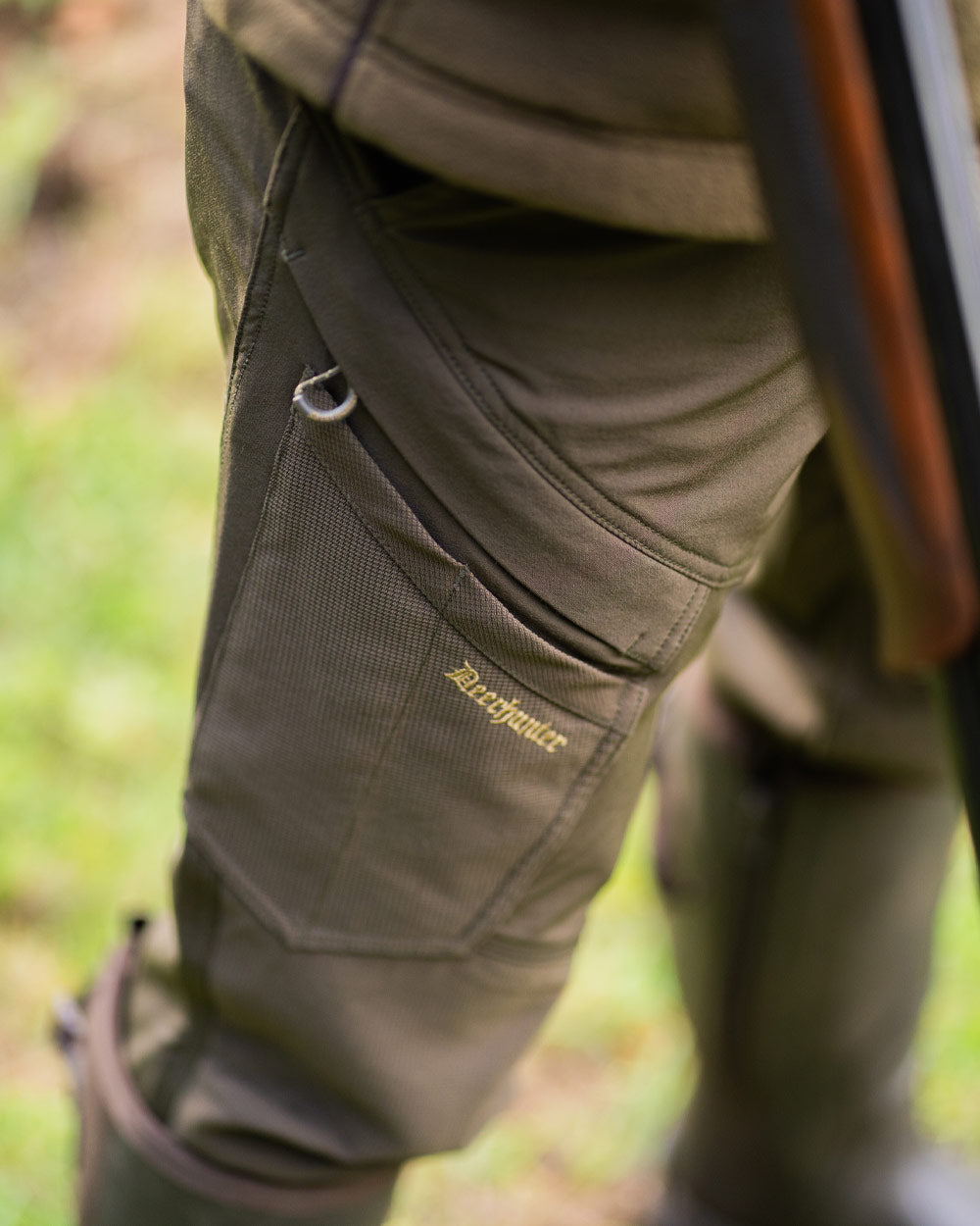 Bark Green coloured Deerhunter Northward Trousers on Outdoor Background #colour_bark-green