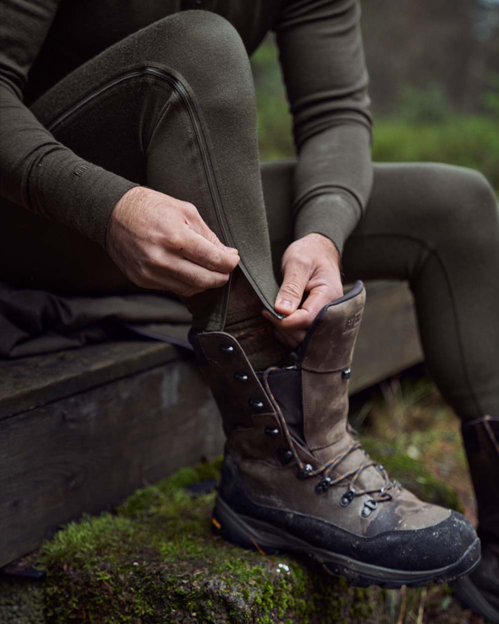 Shadow Brown Harkila Base All Season Side Zip Long Johns on Blurry background #colour_shadow-brown