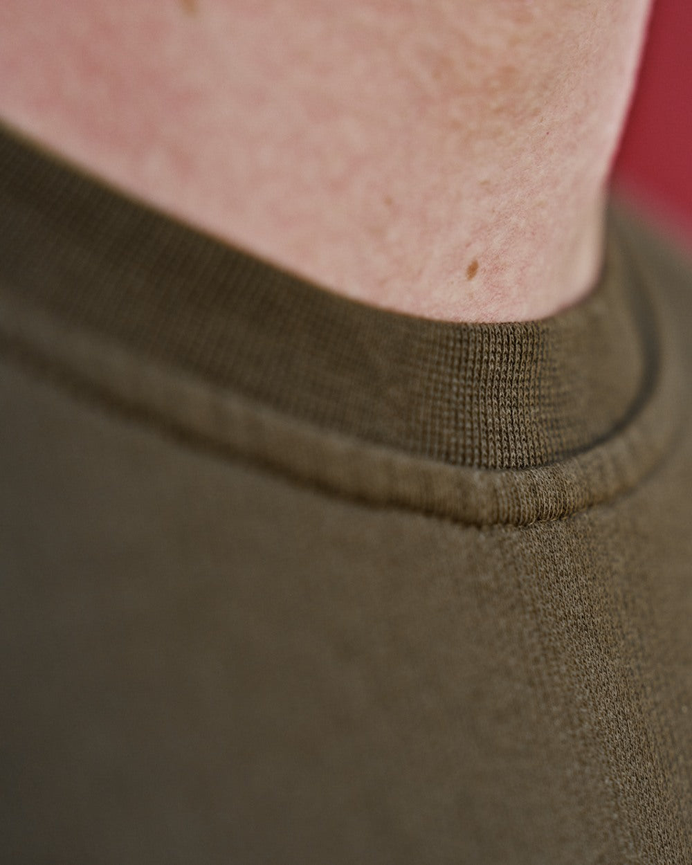 Light Willow Green Coloured Harkila Instinct Sweatshirt on blurry background #colour_light-willow-green