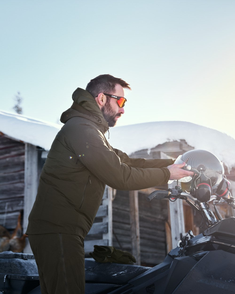 Willow Green Coloured Harkila Logmar HWS Packable Jacket on snow background #colour_willow-green