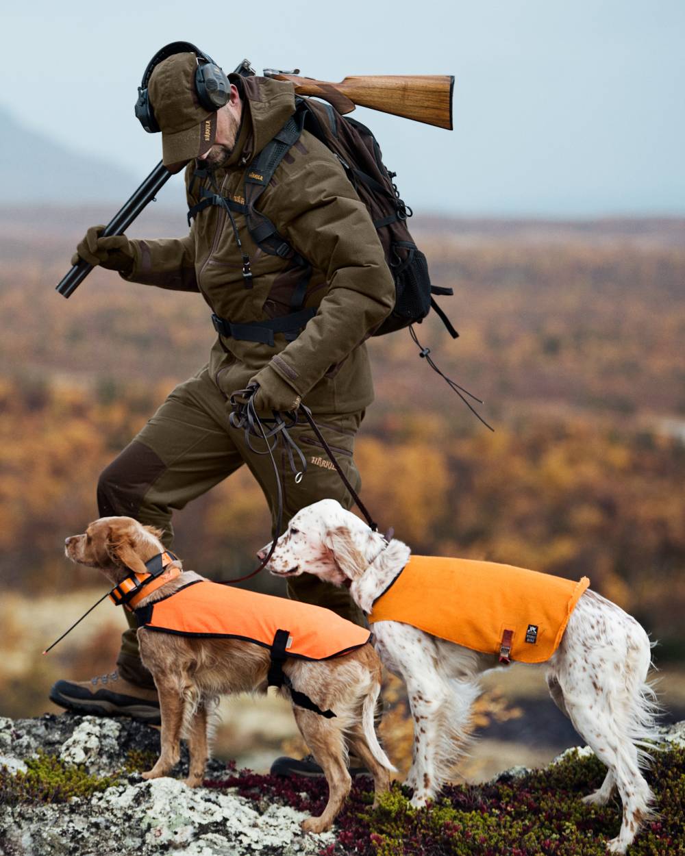 Hunting Green Shadow Brown Coloured Harkila Mountain Hunter Jacket on outdoor background #colour_hunting-green-shadow-brown