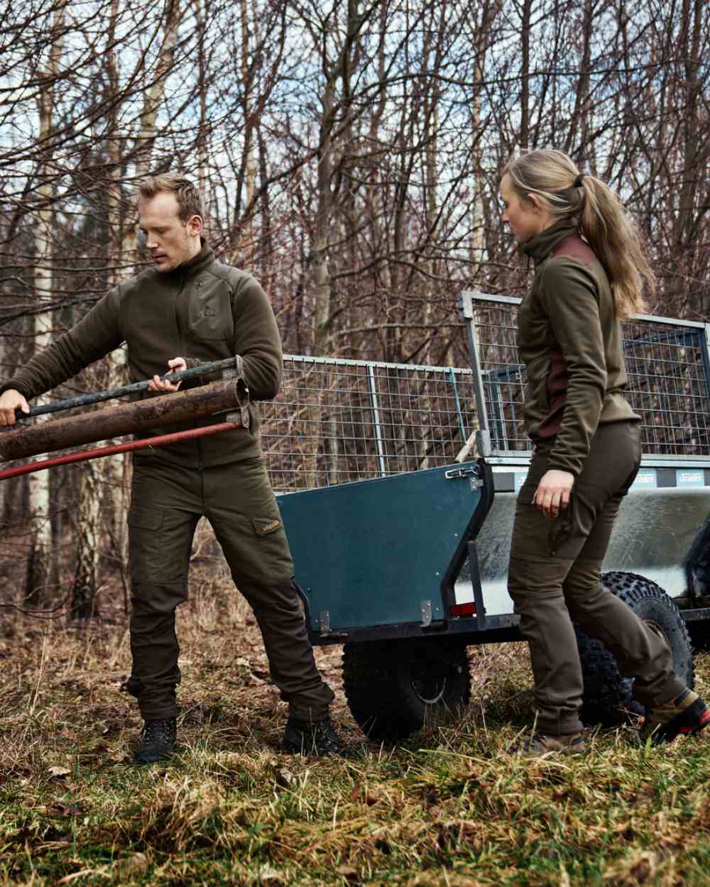 Willow Green Deep Brown Coloured Harkila Womens Scandinavian Pants On A Forest Background #colour_willow-green-deep-brown