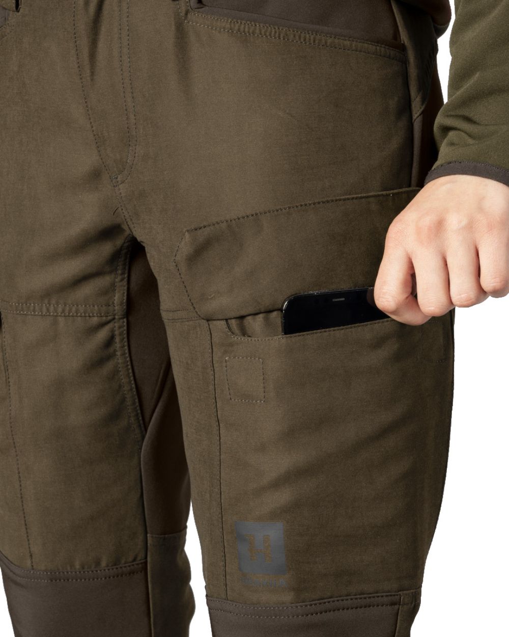 Willow Green Deep Brown Coloured Harkila Womens Scandinavian Pants On A White Background #colour_willow-green-deep-brown