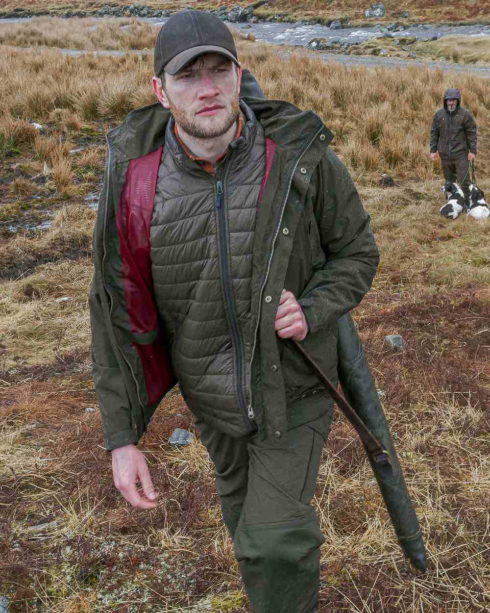 Fen Green Coloured Hoggs of Fife Culloden Waterproof Field Jacket on forest background #colour_fen-green