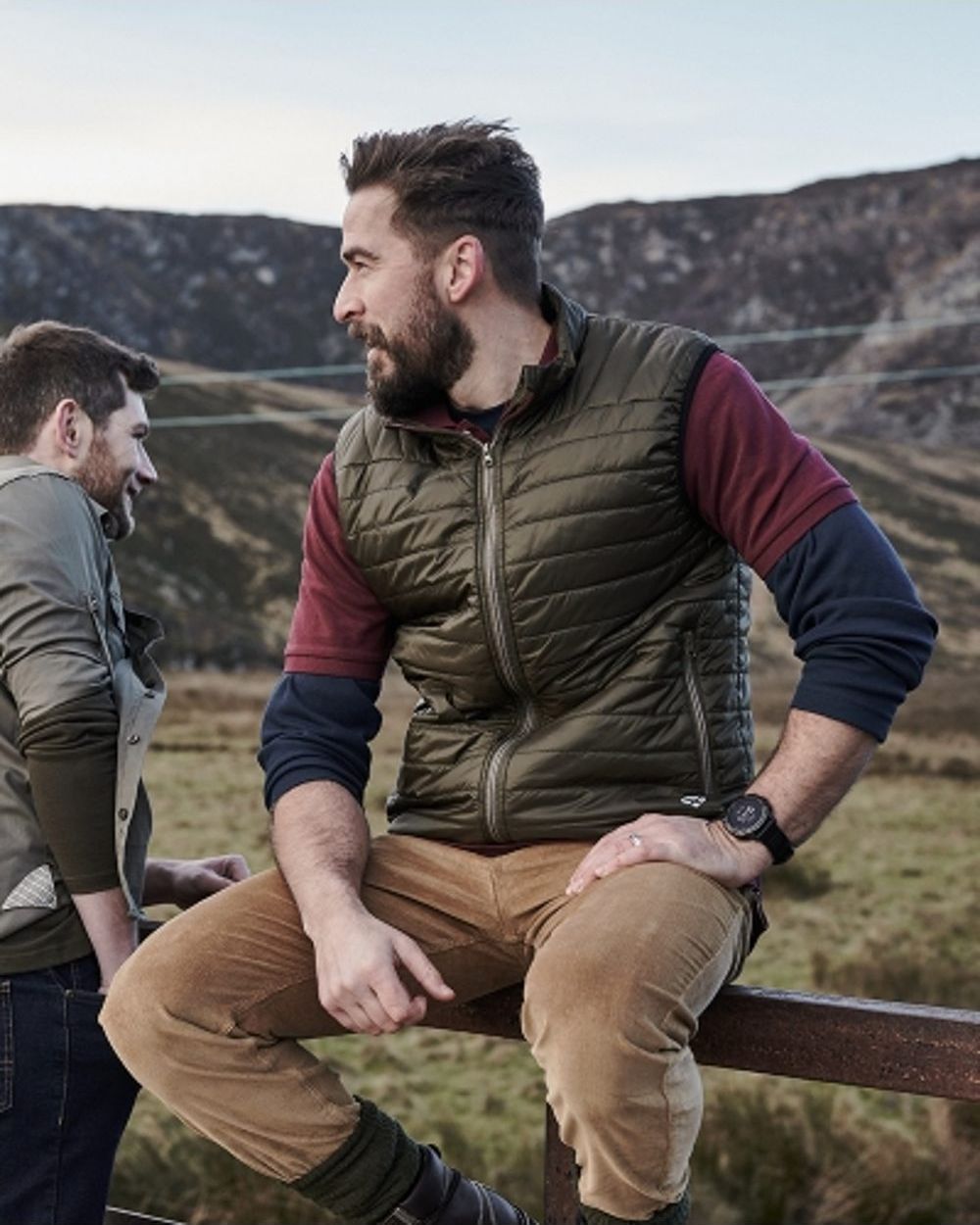 Olive/Merlot coloured Hoggs of Fife Kingston Rip-Stop Gilet on mountain background #colour_olive-merlot