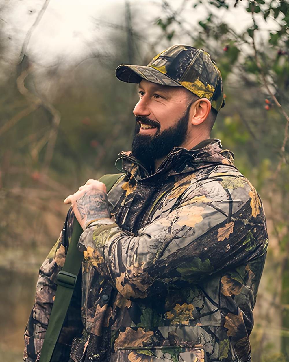 EVO coloured Jack Pyke Rannock Jacket on forest background #colour_evo