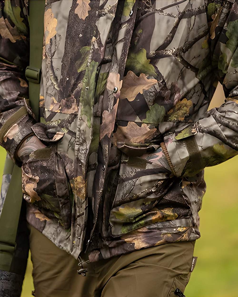EVO coloured Jack Pyke Rannock Jacket on forest background #colour_evo