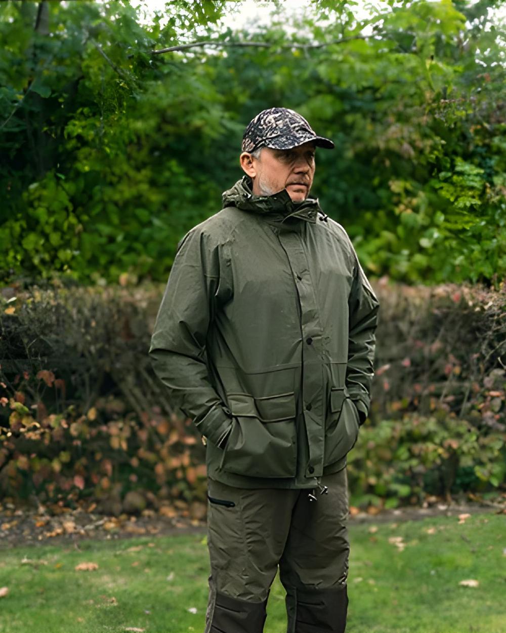 Green coloured Jack Pyke Rannock Jacket on tree background #colour_green