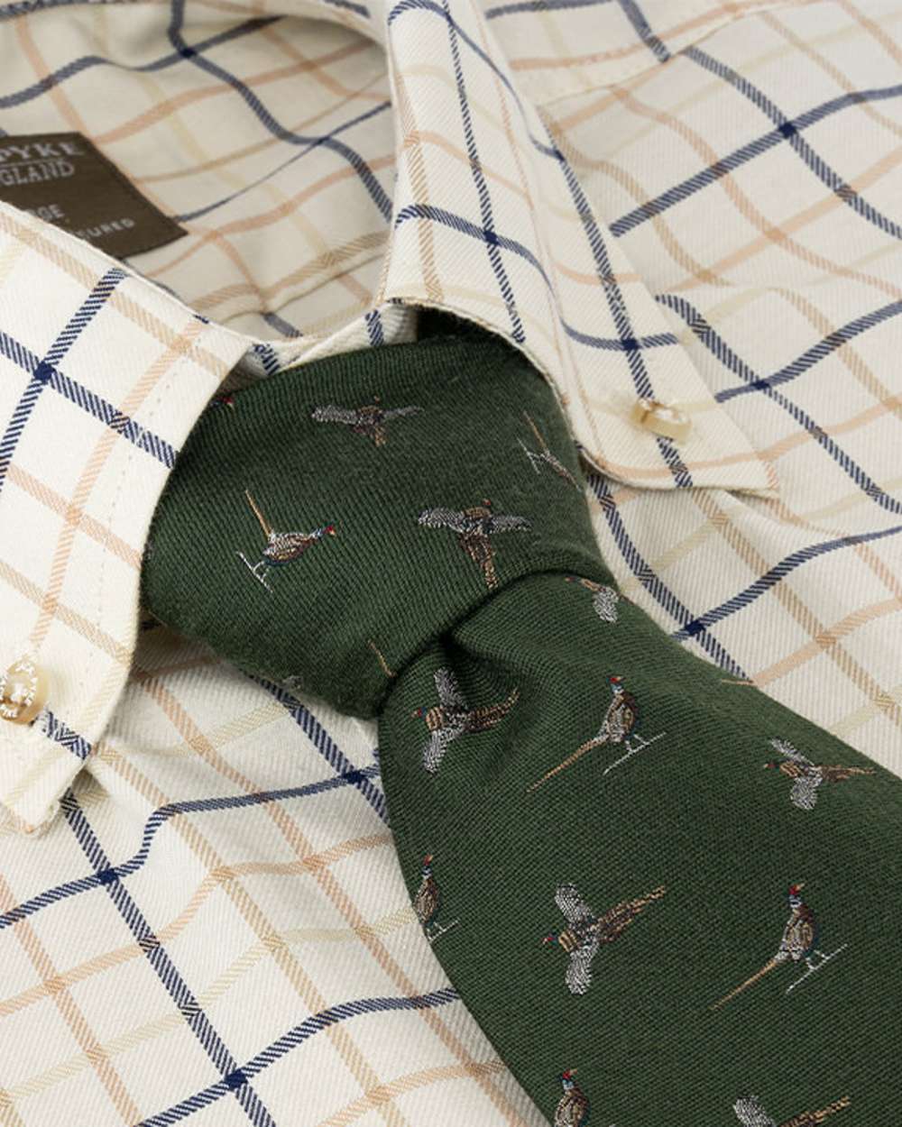 Green coloured Jack Pyke Silk Tie Pheasant on shirt background #colour_green