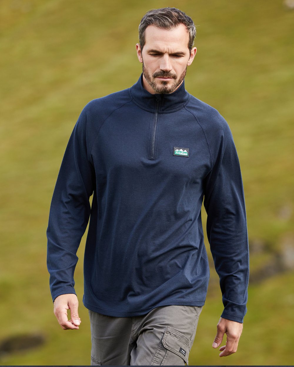 Navy Marl Coloured Ridgeline Mens Baseline Pull on Zip Top On A Field Background #colour_navy-marl